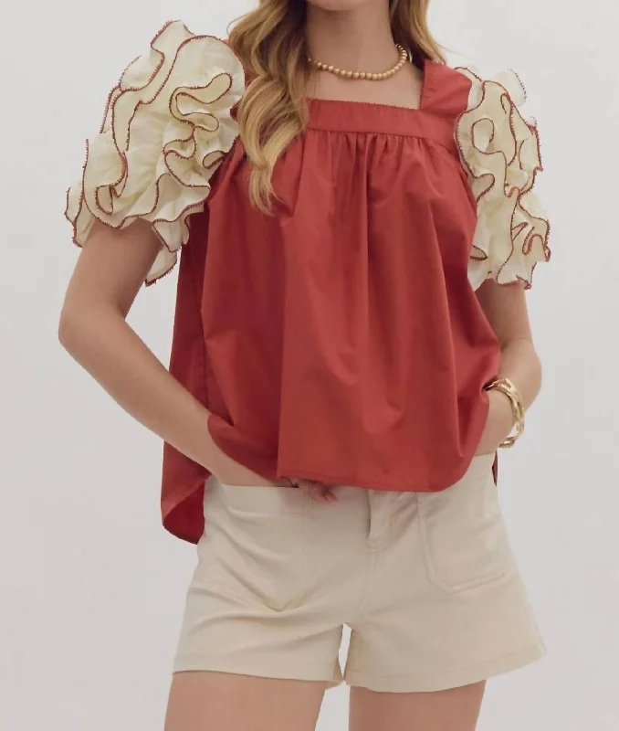 Don’t Miss Out Brick Blouse With White Ruffle